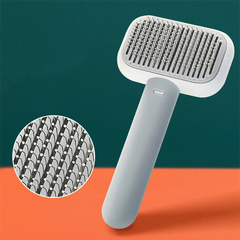 Premium pet hair brush and massage comb for cats and dogs in grey, pink, and green colors