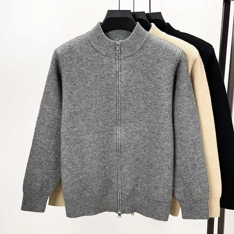Men's grey knitted zip cardigan with stand collar showing loose fit and thickened fabric texture