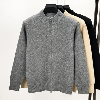 Men's grey knitted zip cardigan with stand collar showing loose fit and thickened fabric texture