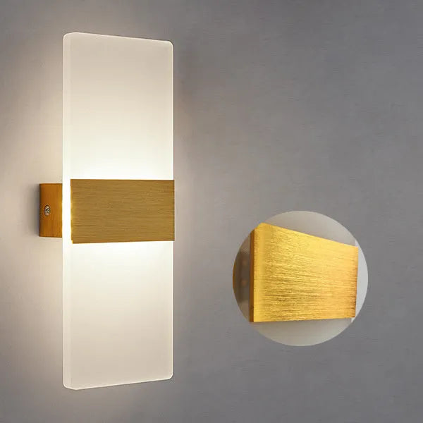Modern rectangular acrylic LED wall lamp in a choice of black, gold or silver finishes.
