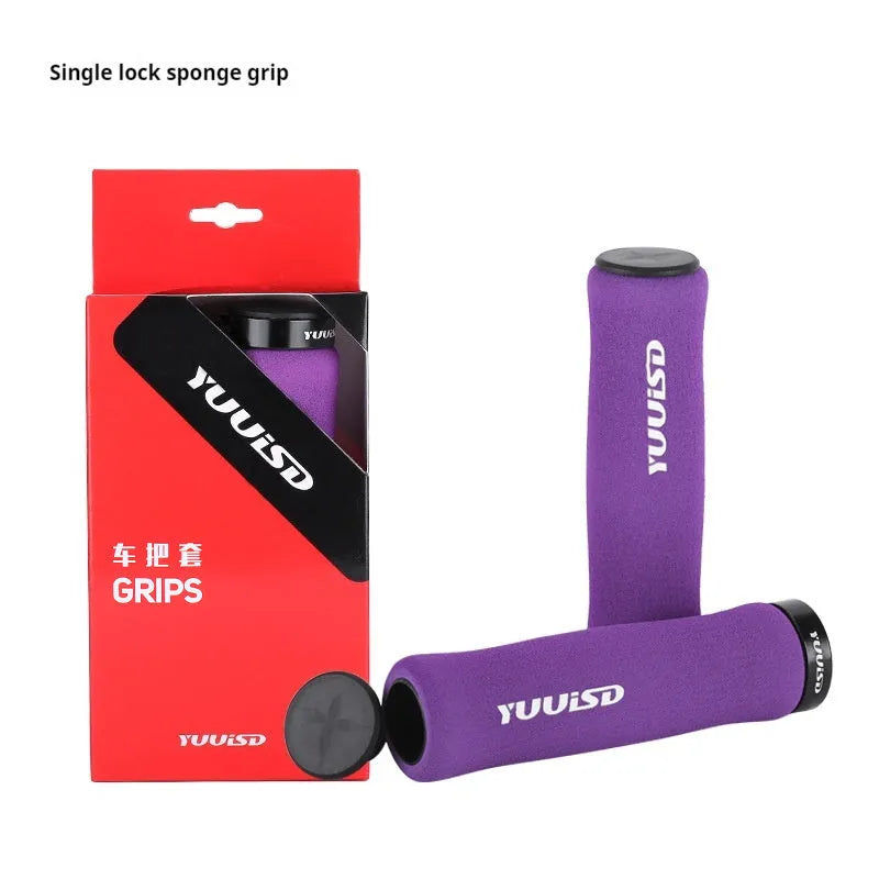 Mountain bike handle cover in soft sponge material with shock absorber design