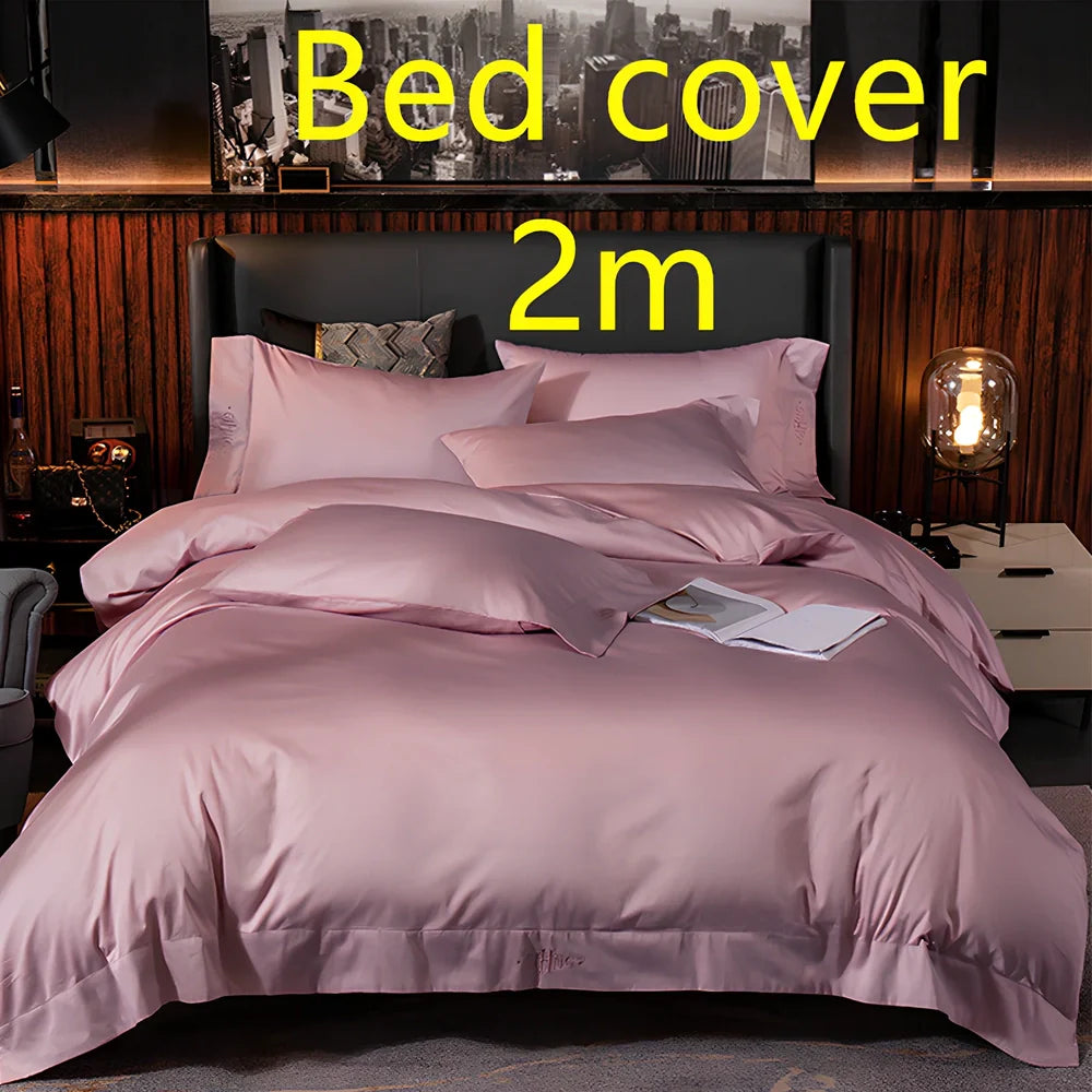 Four-piece cotton bedding set with satin weave fabric showing quilting detail and colour options