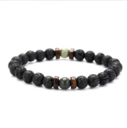 A stylish and durable men's bracelet made with volcanic stone, flash stone, and wood chips