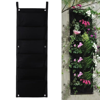 Vertical wall garden planter with multiple planting pockets made from recycled felt material