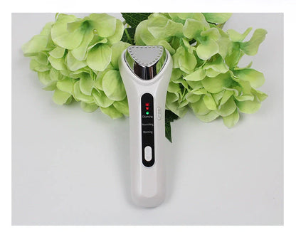 Electric Ultrasonic Facial Beauty Device in white, compact and USB-powered for skincare