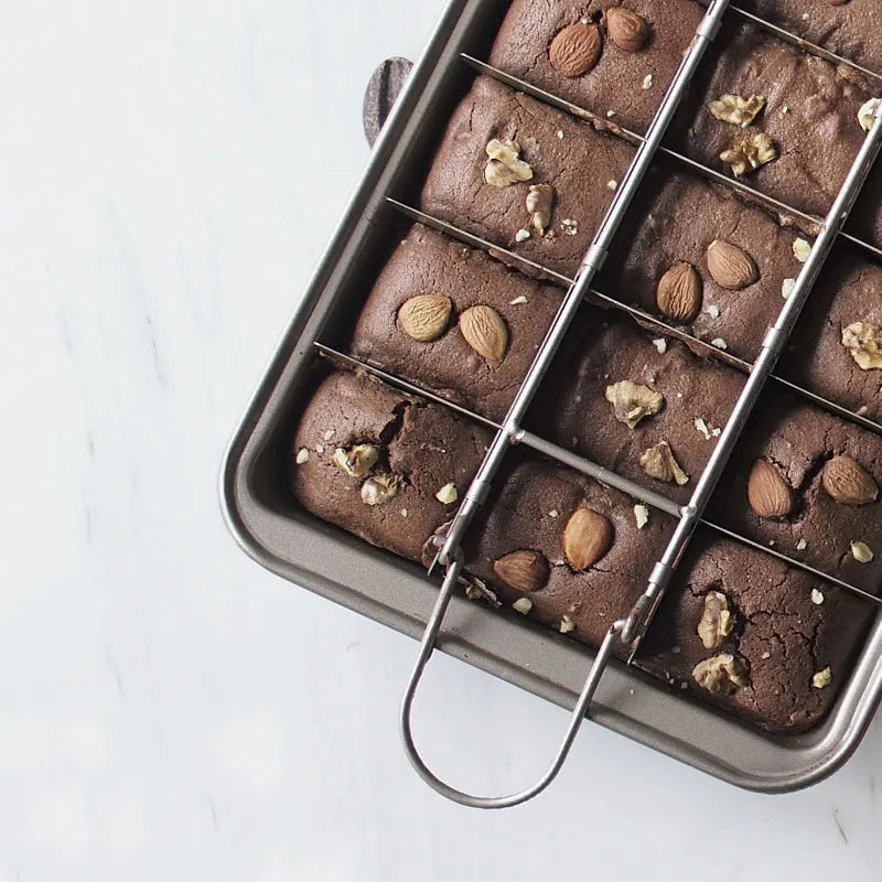Silver checkered brownie baking pan with square moulds on high carbon steel