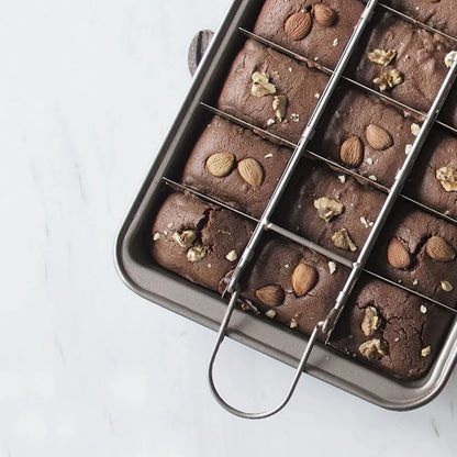 Silver checkered brownie baking pan with square moulds on high carbon steel