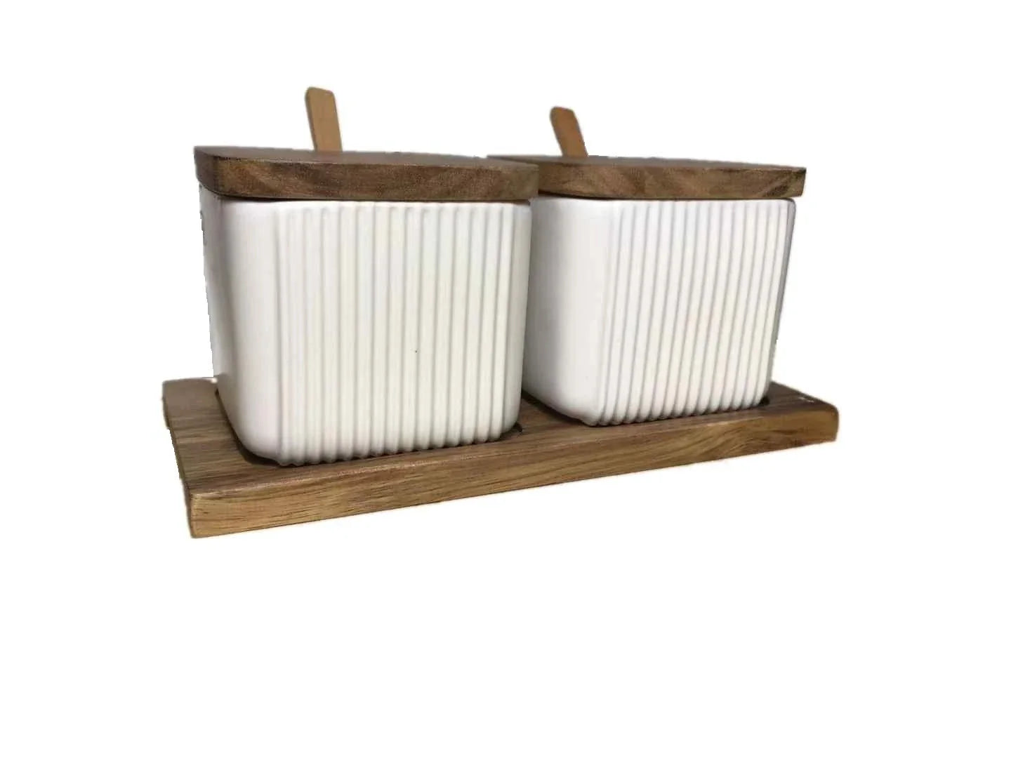 Stylish ceramic seasoning jars in a modern kitchen setting, featuring a matte glaze finish and a variety of color options.