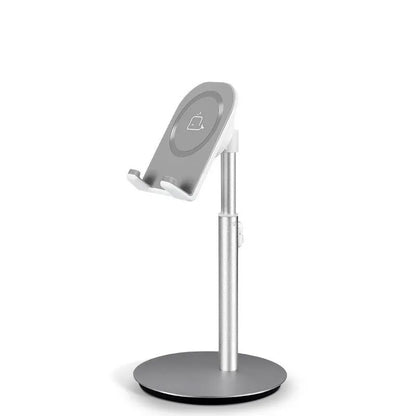 Silver metal desktop stand holding tablet and phone for hands-free viewing