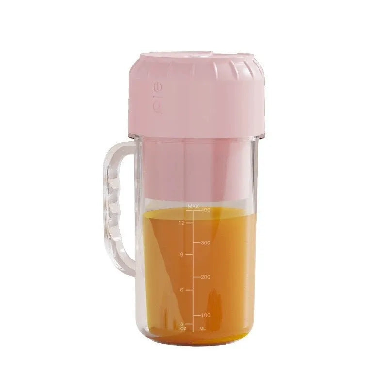 Portable USB-powered juicer in cherry blossom pink or avocado green with 150W motor