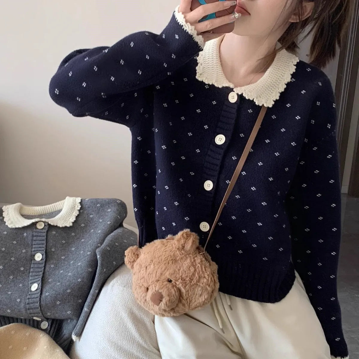 Women's floral pattern knit cardigan with Peter Pan collar in navy blue colour