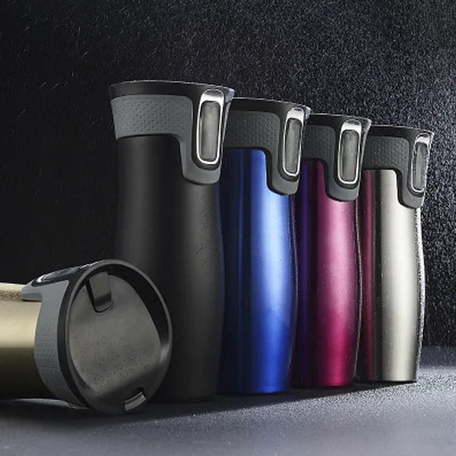 Black vacuum insulated stainless steel travel flask with push-button lid, 450ml capacity.