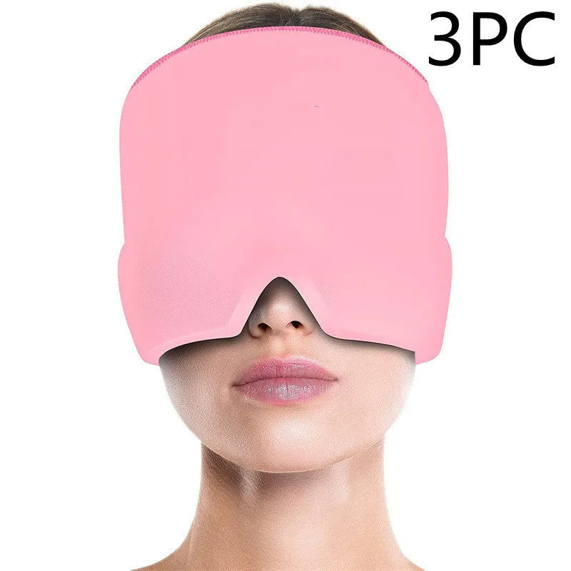 Black elastic cloth gel cold compress eye mask for headache relief on a grey background.