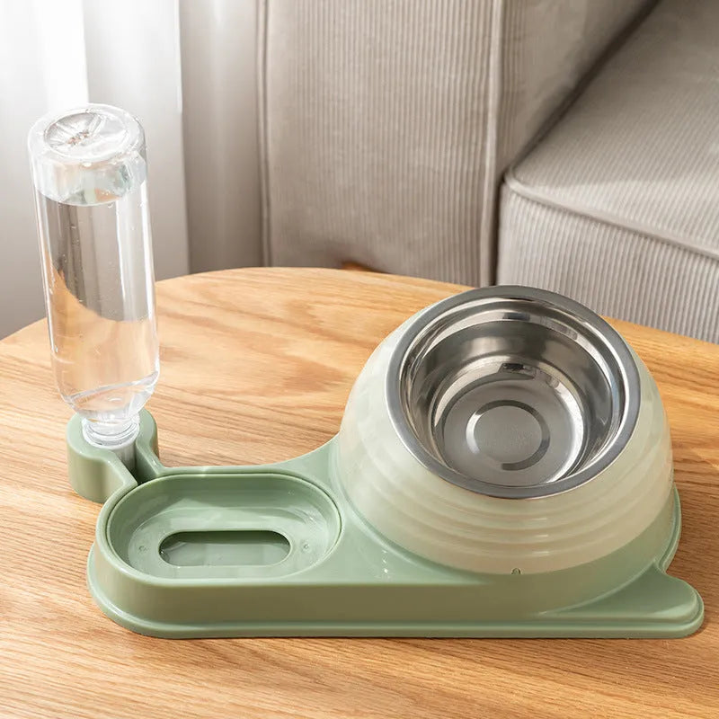 Brown elevated pet feeding bowl with attached water bottle for cats and small dogs on a wooden floor.