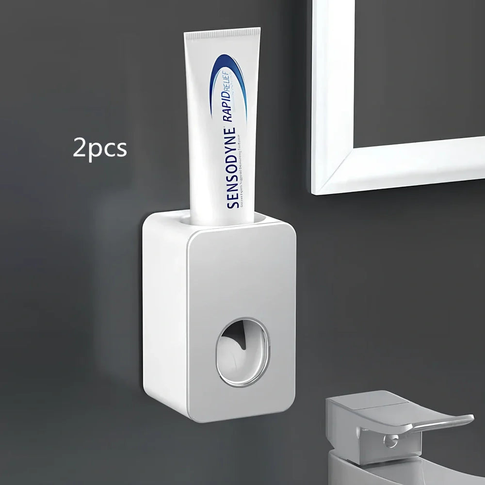 Black wall-mounted automatic toothpaste dispenser with 1 ml pump, punch-free adhesive, 18 cm height for bathroom use