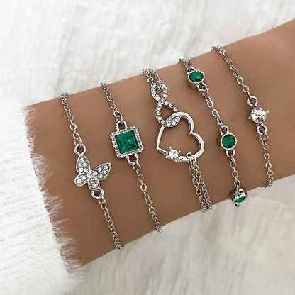 Bohemian 5-piece green crystal bracelets set for women featuring a unique heart design