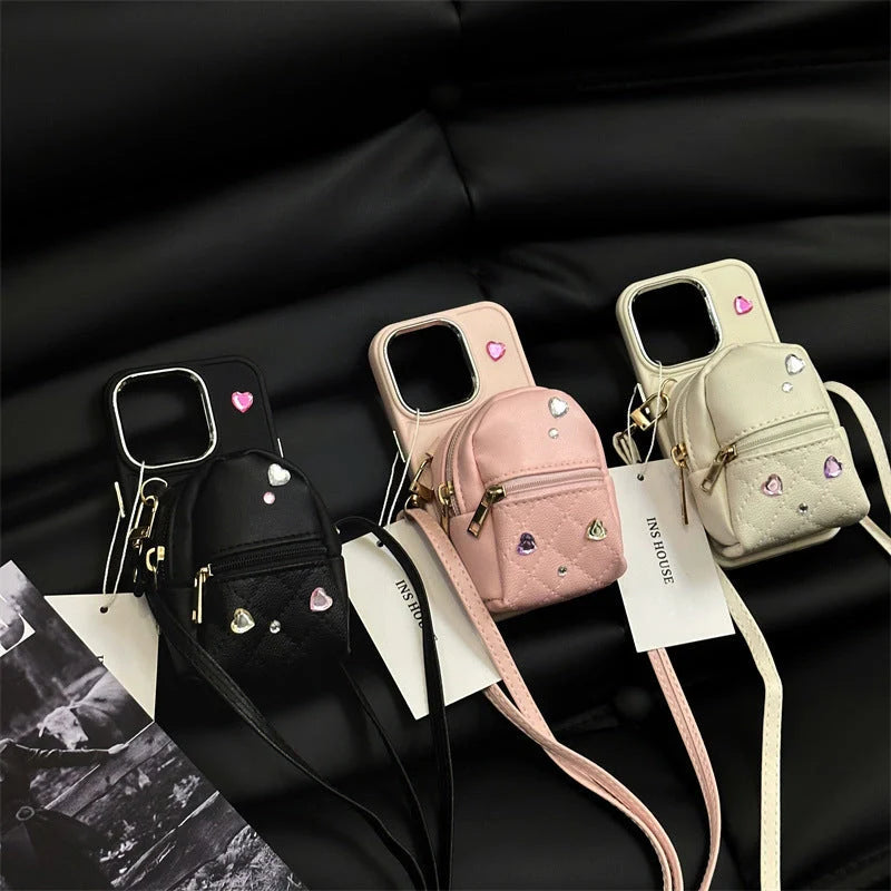 Crossbody Wallet Phone Case for ApplePhone in white, black, and pink with removable strap