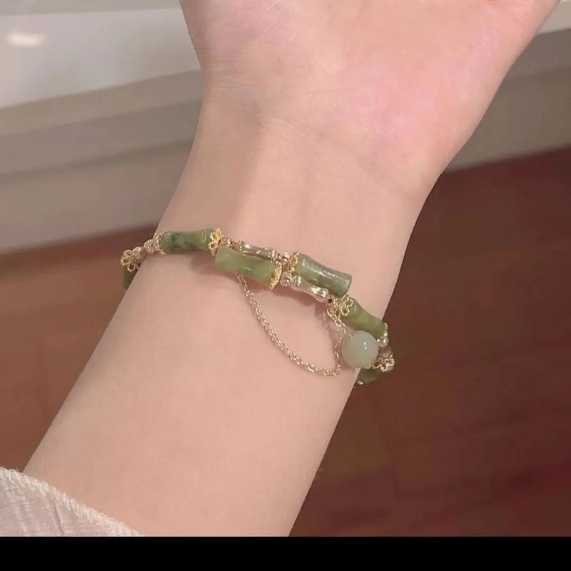 Bamboo beaded bracelet for women with personalised plum wine colour glaze beads and bamboo joint design featuring baking varnish treatment for a smooth polished finish suitable for everyday wear