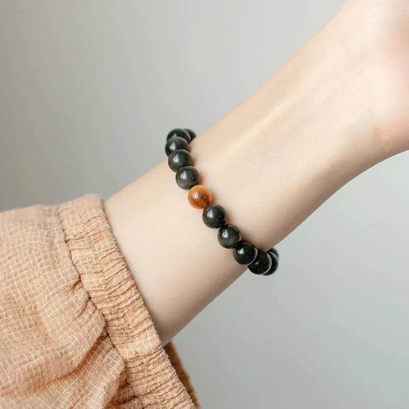 Black obsidian stone bracelet with geometric beads in unisex Korean style.
