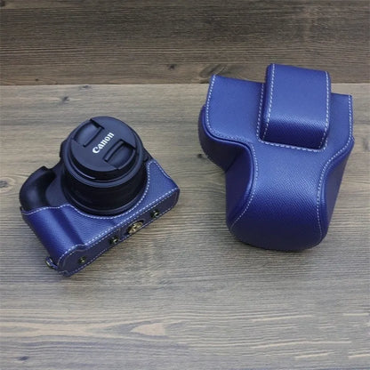 PU shoulder bag for a single mirrorless camera, shown in oil skin or palm print finish