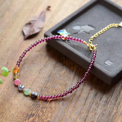 Women's garnet anklets with geometric design and purple gemstone beads