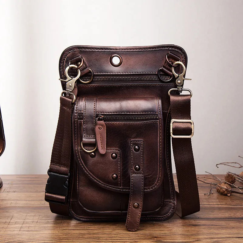 Men's black genuine cowhide leather fanny pack with zipper open showing internal phone and ID compartments