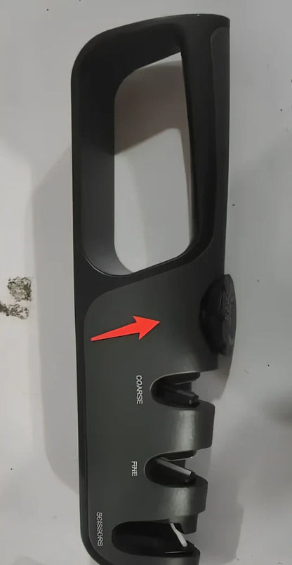 Grey-black manual sharpener with adjustable mechanism for knives and scissors measuring 265x70x45mm