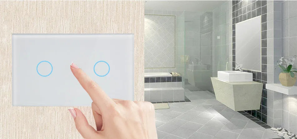 White tempered glass smart touch light switch with blue LED indicator on a UK wall.