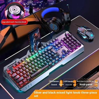 Aluminium alloy mechanical gaming keyboard with rainbow lighting, shown with a macro mouse and gaming headset.