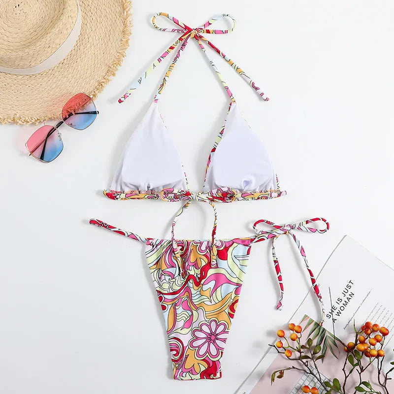 Women's triangle printed bikini with halter neck design in multicolor pattern