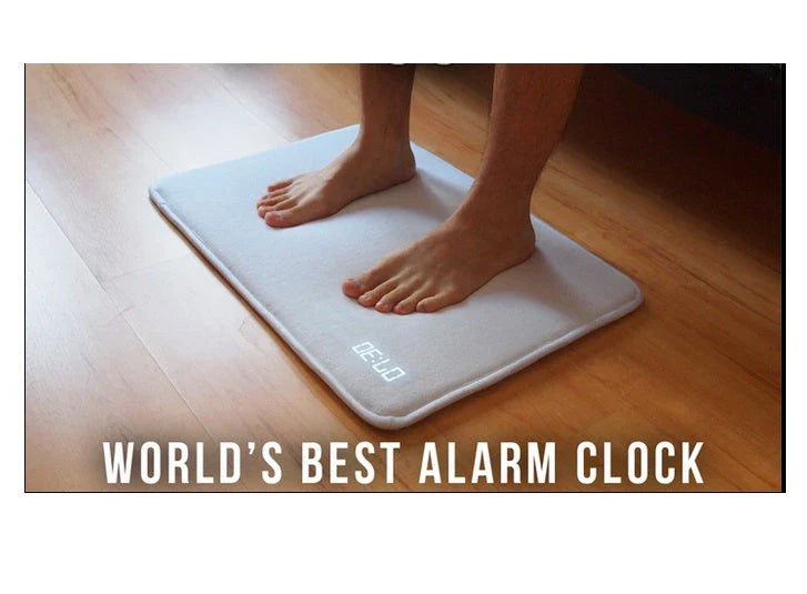 Smart pressure-sensitive alarm clock with LED display and memory foam base for comfortable, refreshing mornings
