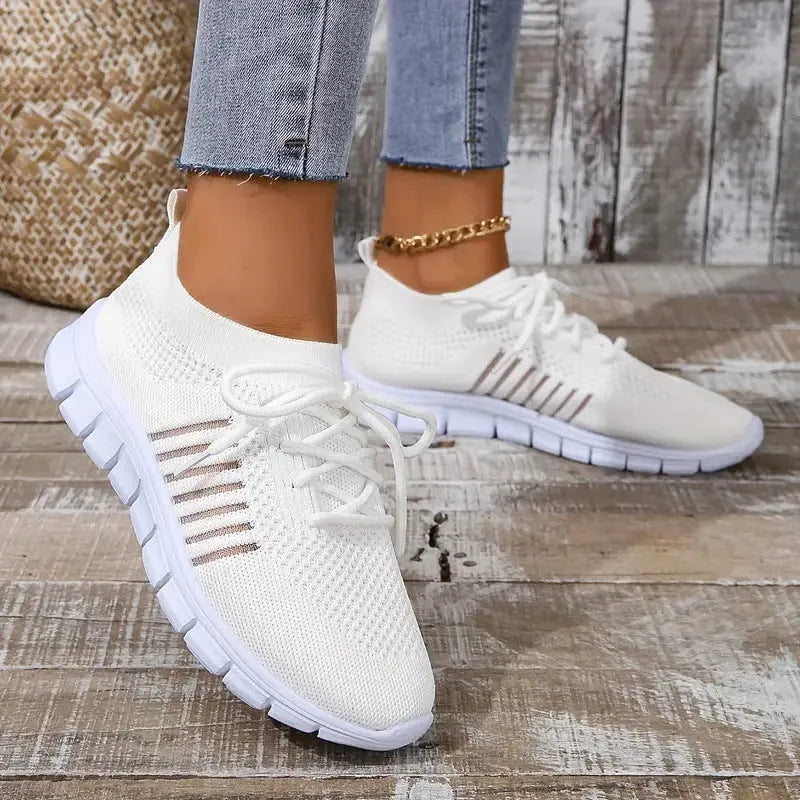 Women's flying knit casual flats with mesh upper, round toe, and front-tie design in multiple colour options