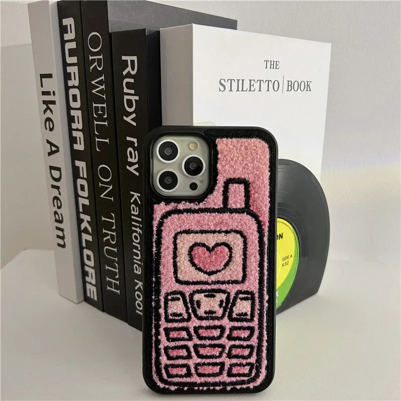 Pink iPhone back cover case with embroidered towel texture design for iPhone models X through 15 Pro Max.