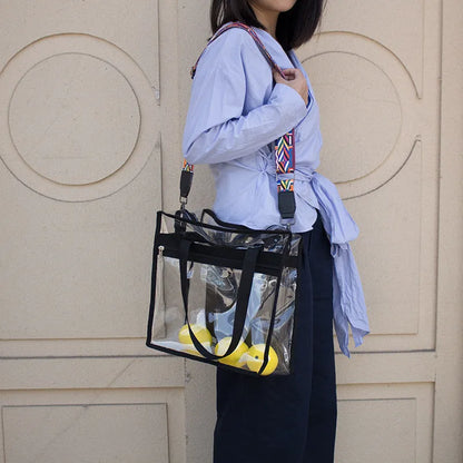 Clear PVC women's messenger bag with a coloured front panel and double shoulder straps.