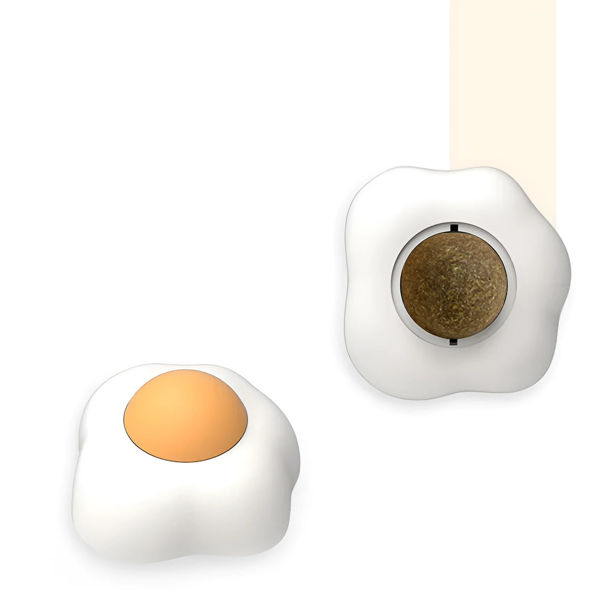 Fried egg shaped plush cat toy stuck to a window with a cat paw batting the 360-degree rotating ball.
