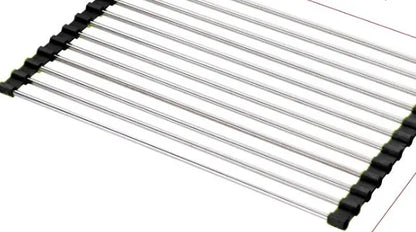 Folding stainless steel kitchen drain rack with coloured plastic tubes, shown open for use.