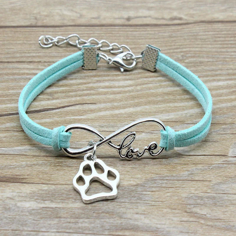 Stylish hand-woven infinite love pet bracelet in various colours, featuring a bow design and made of premium alloy materials