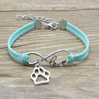 Stylish hand-woven infinite love pet bracelet in various colours, featuring a bow design and made of premium alloy materials