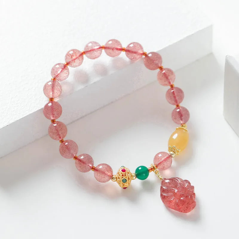 Women's crystal beaded bracelet featuring genuine strawberry quartz gemstones with polished Nine Tail Fox design in a natural style, measuring 20 grams in weight for everyday wear and special occasions