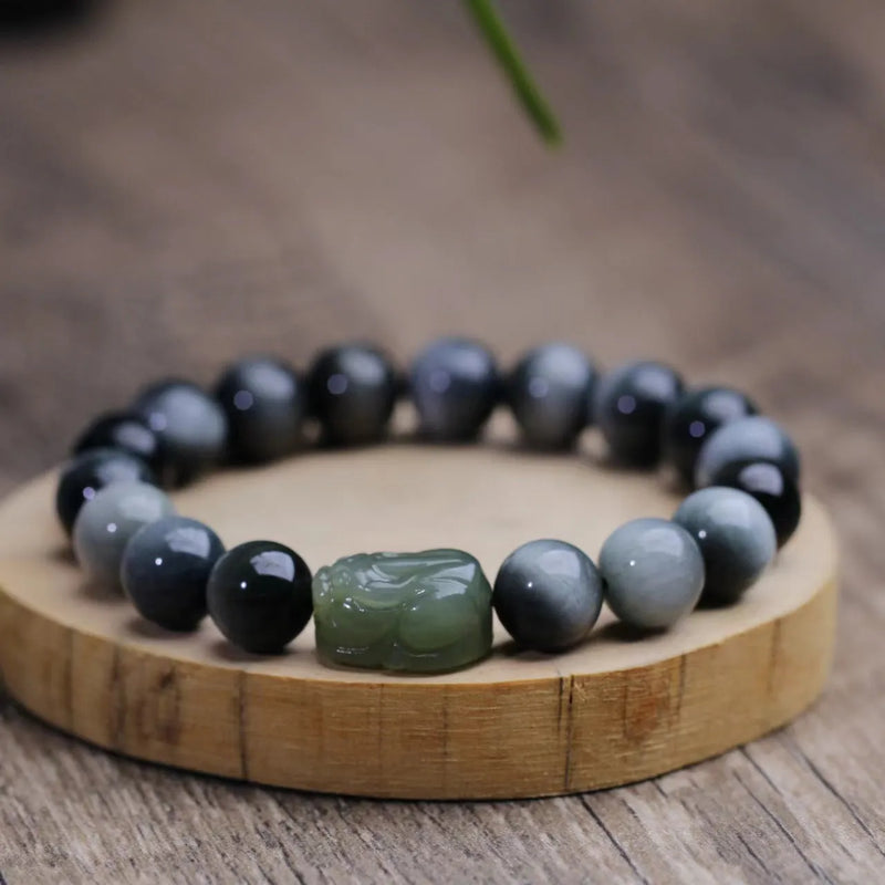 Natural Hetian Jade Clear Water Pixiu Bracelet with 10mm Eagle Eye Stone beads, handcrafted unisex spiritual jewellery gift for anniversary celebrations, black bead colour option.