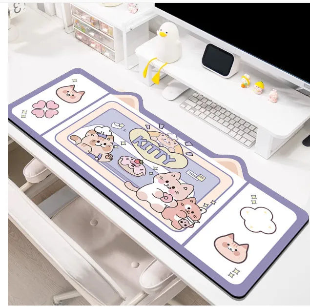 Oversized mouse pad on desk showing natural rubber base and solid colour design in available sizes from 20x26cm to 50x100cm