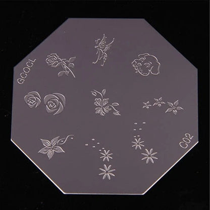 White plastic nail art stamping machine with six stainless steel pattern plates on wooden desk