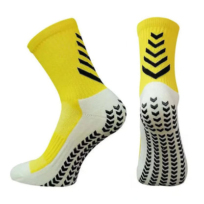 Men's mid-calf athletic football socks with geometric patterns and silicone grip sole