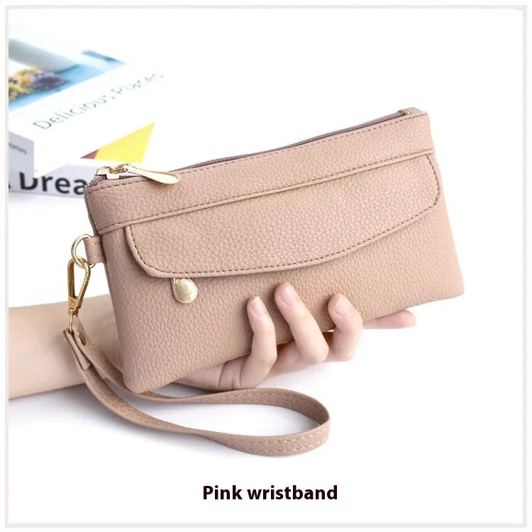 Soft surface square PU crossbody bag and clutch with internal zipper pocket in various colours.