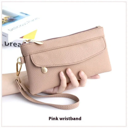 Soft surface square PU crossbody bag and clutch with internal zipper pocket in various colours.