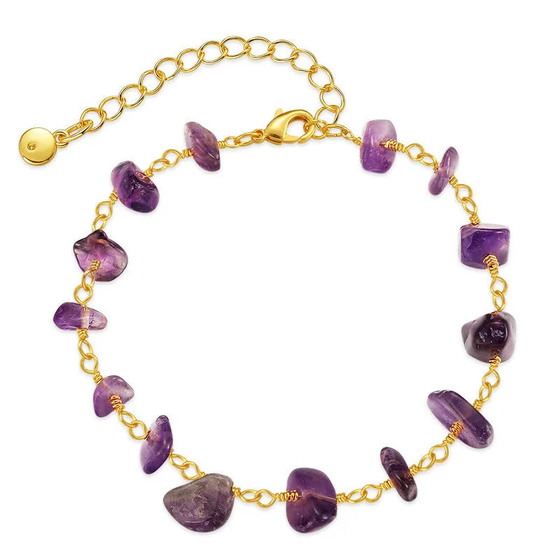 Geometric women's bracelet with irregular turquoise stones in 18K copper on a white background.