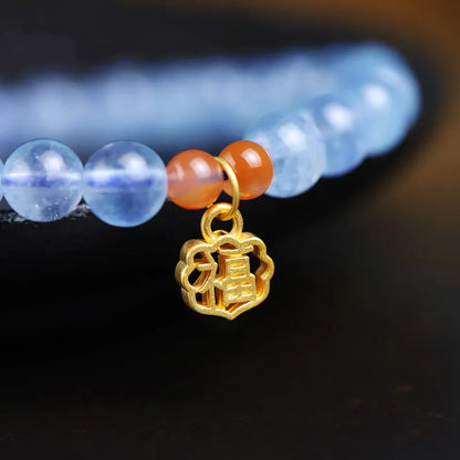 Ice translucent aquamarine crystal bracelet with 8mm round beads and sequin accents