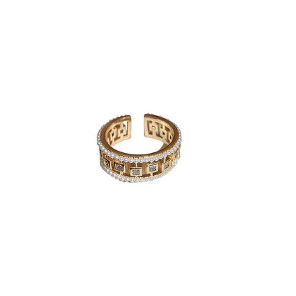Elegant square ring with hollowed-out design and shimmering zircon stones, perfect for the stylish British woman