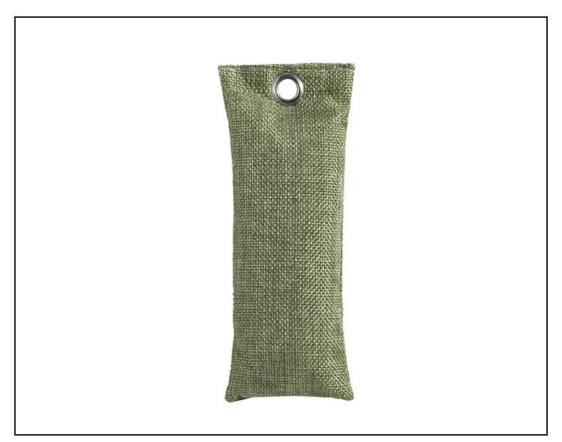Set of black, green, grey, and blue rectangular bamboo charcoal deodorising bags on a white surface.