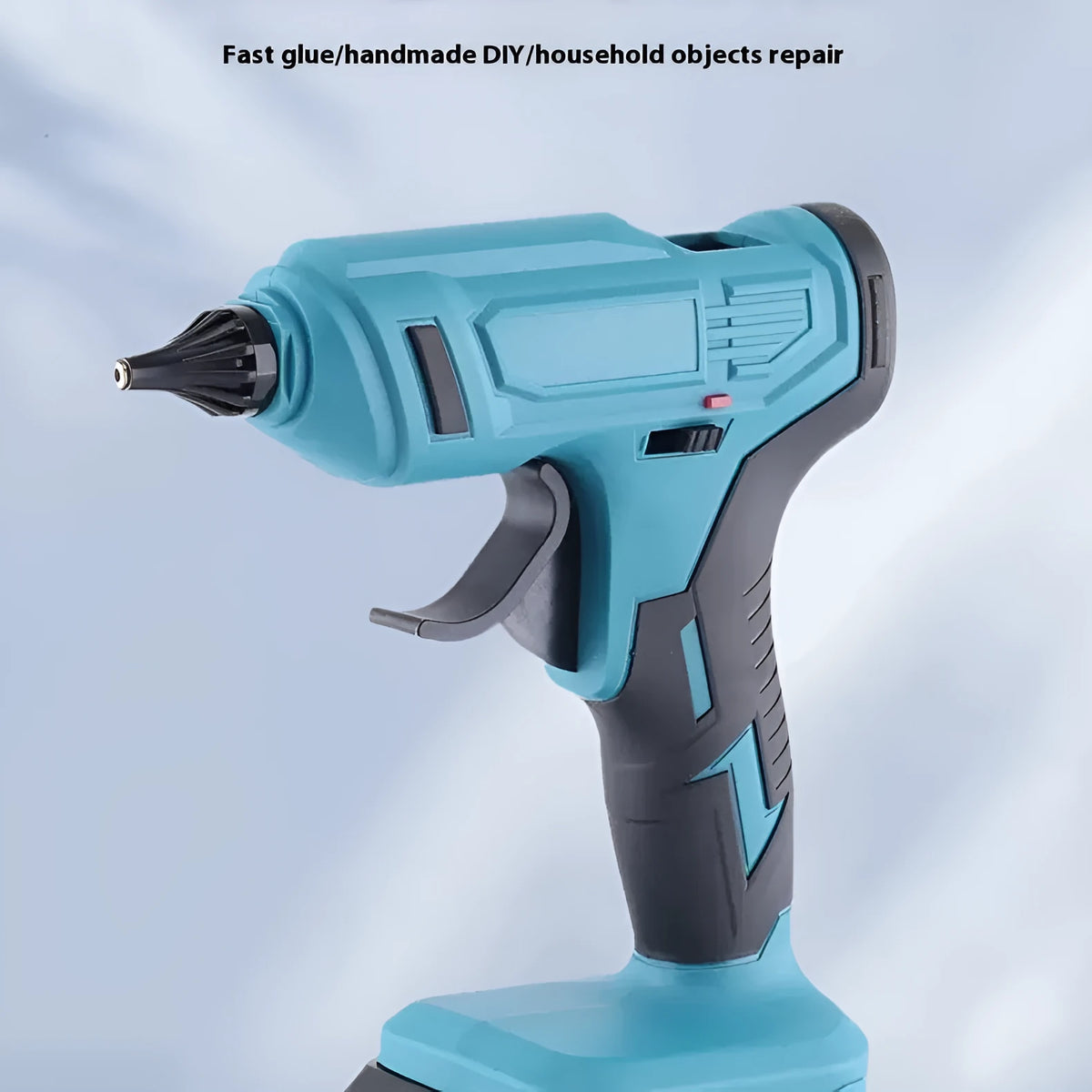 Cordless rechargeable hot melt glue gun with bare metal body, battery, charger, and pack of glue sticks.